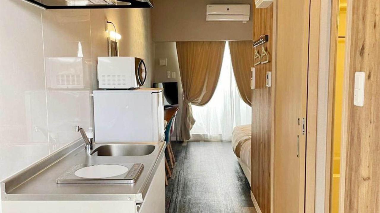 Hygge Biimata Aparthotel Nago Bagian luar foto