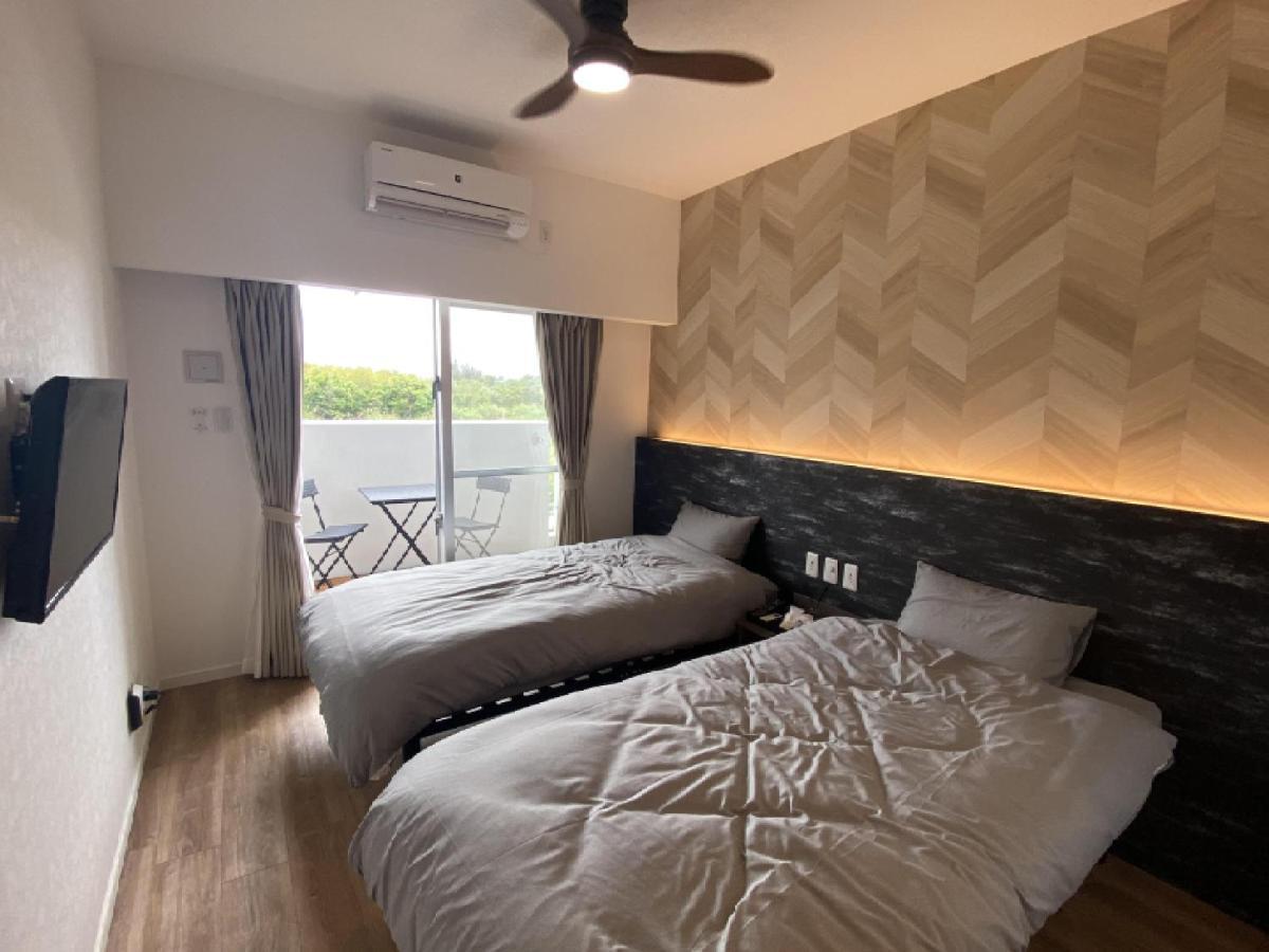 Hygge Biimata Aparthotel Nago Bagian luar foto