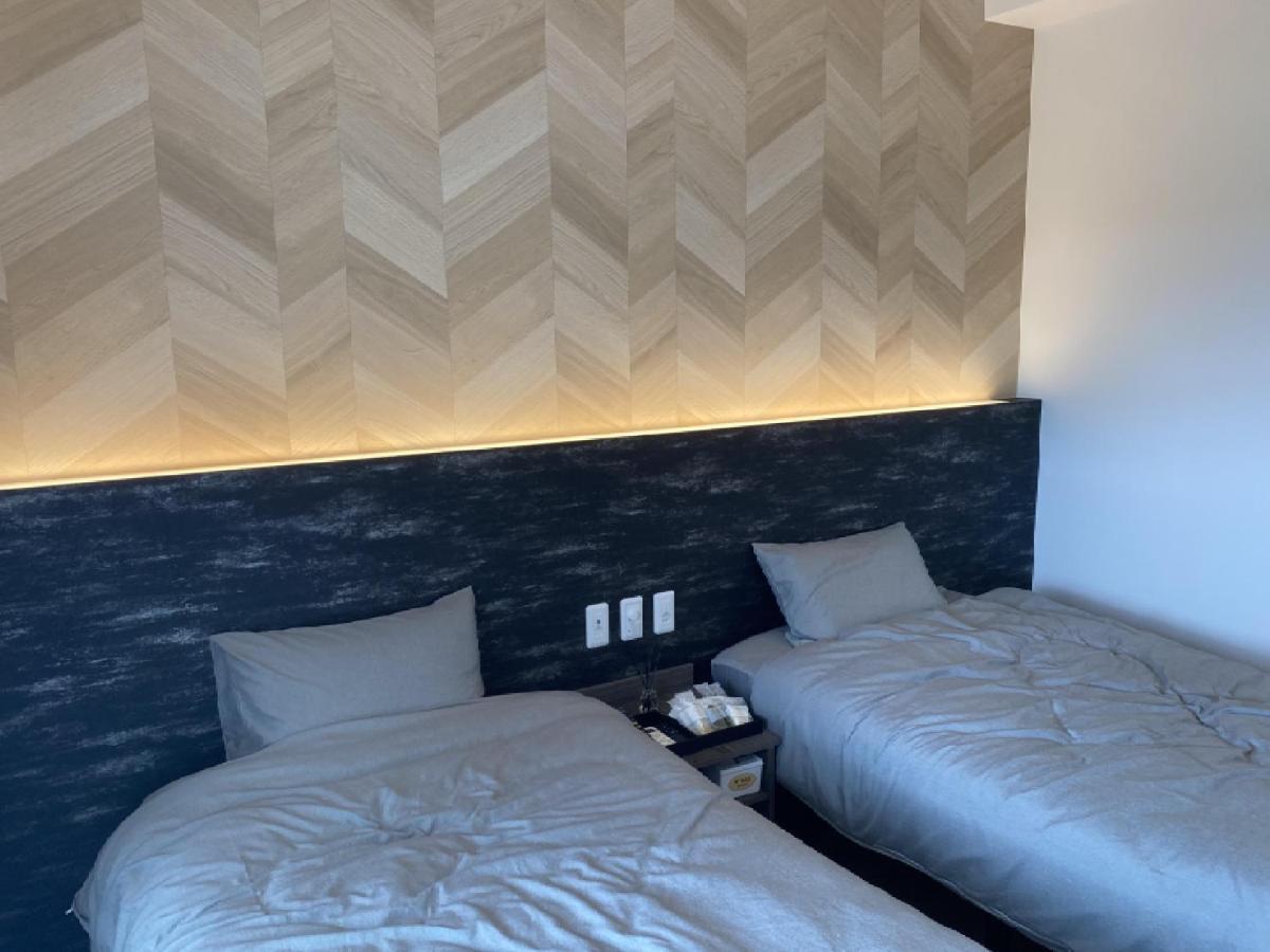 Hygge Biimata Aparthotel Nago Bagian luar foto
