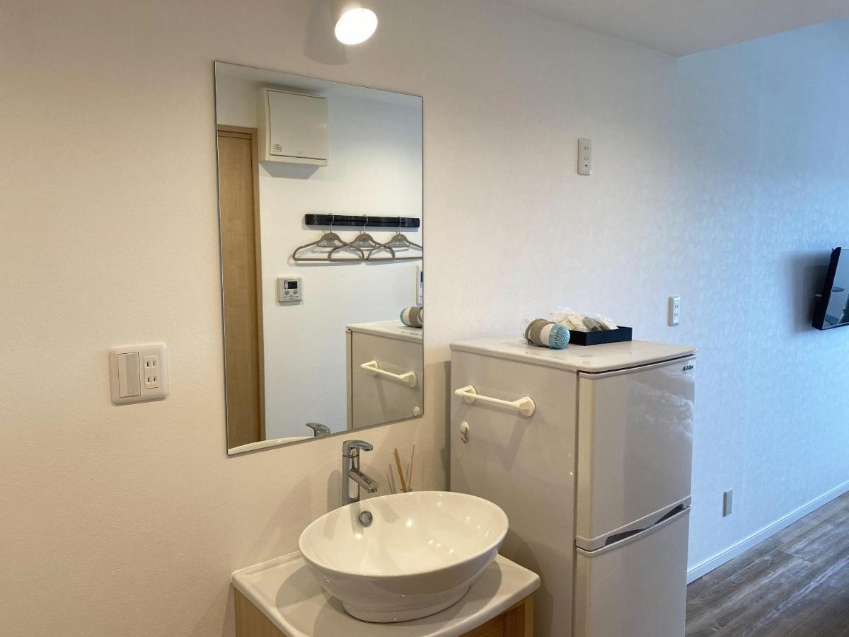 Hygge Biimata Aparthotel Nago Bagian luar foto